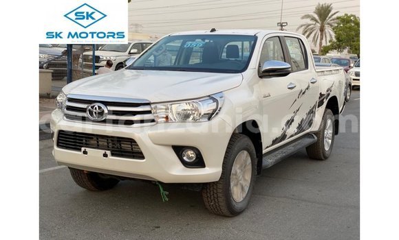 Buy Import Toyota Hilux White Car in Import - Dubai in Arusha