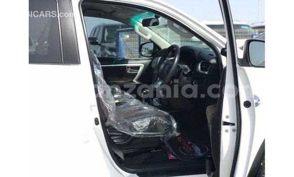 Buy Import Toyota Fortuner White Car in Import - Dubai in Arusha Buy Import Toyota Fortuner White Car in Import - Dubai in Arusha